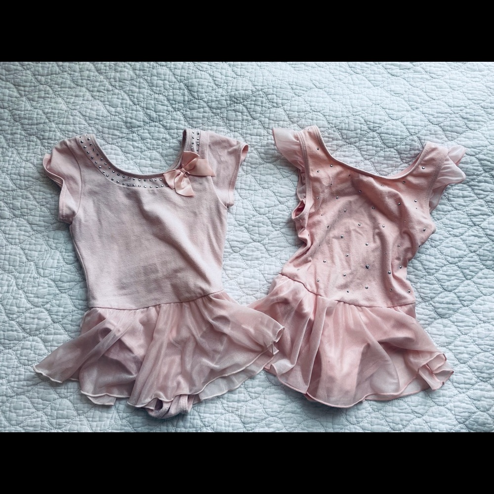 Two pink leotards